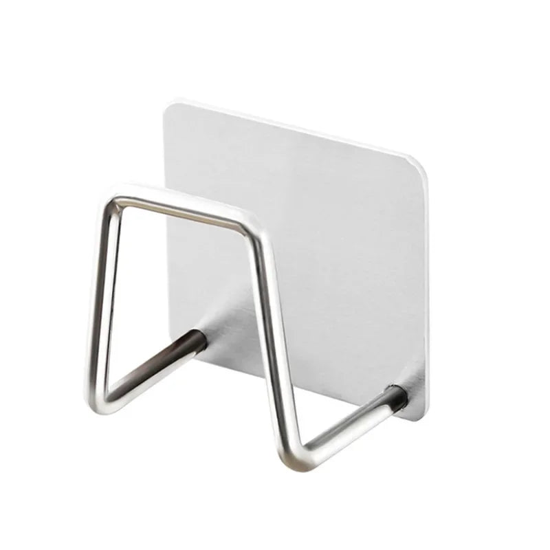 Wall-mounted metal hook with white backing on a white background