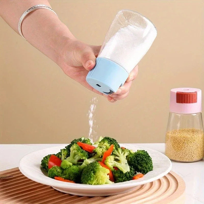 Person seasoning broccoli with a salt shaker on a beige background