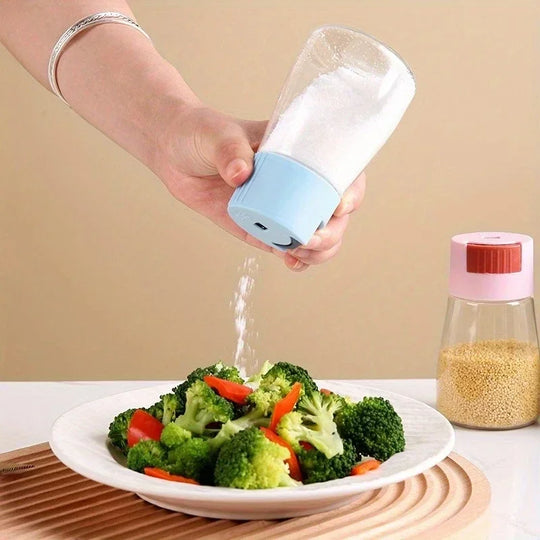 Person seasoning broccoli with a salt shaker on a beige background