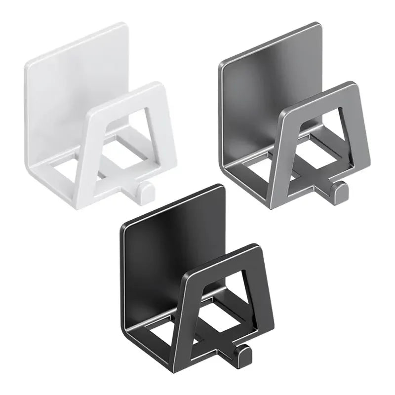 Three metal phone stands in white, black, and gray on a white background