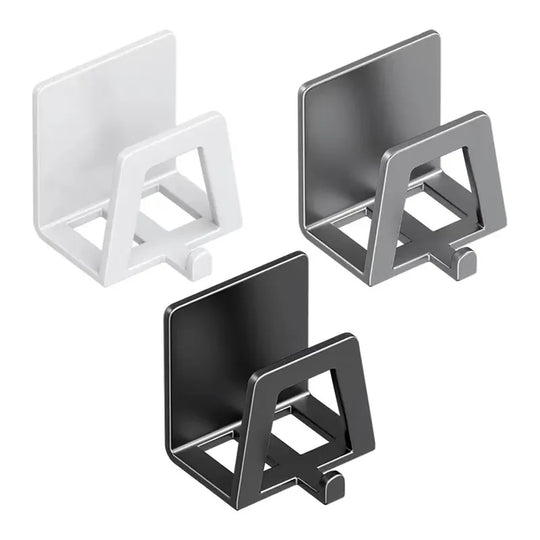 Three metal phone stands in white, black, and gray on a white background
