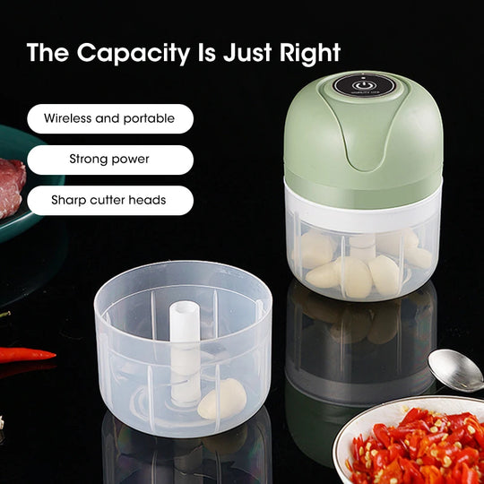 Portable food chopper with ingredients on a reflective surface